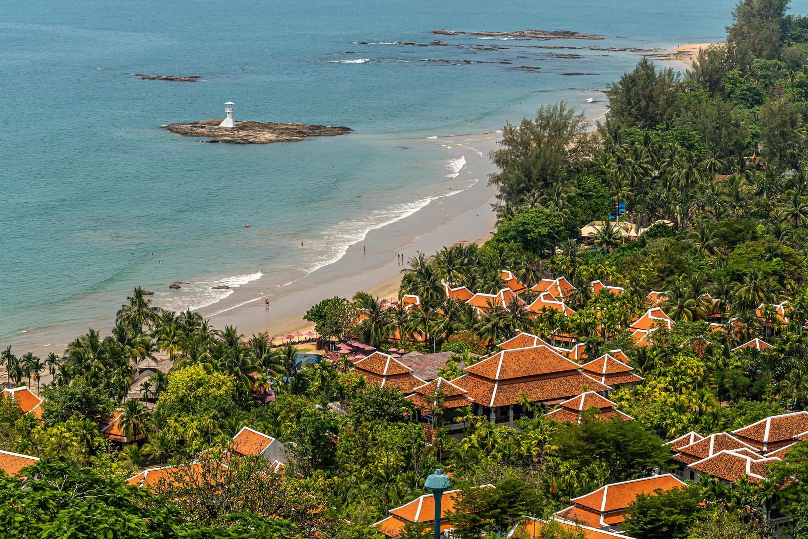 Aerial view of beachfront village with palm trees at Lamai Beach Koh Samui