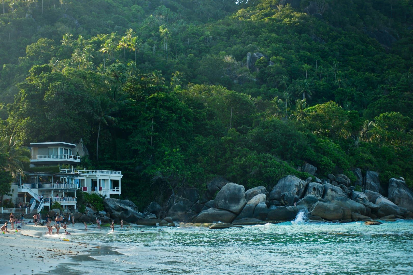 Tropical cove with lush green hills and white sand at Silver Beach Koh Samui