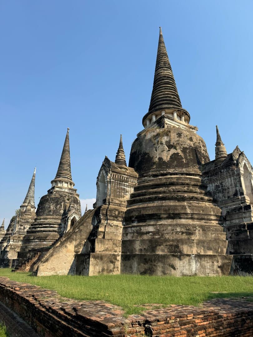 Ancient temple stupas representing the traditional Buddhist architecture found at Wat Pradoem Koh Samui